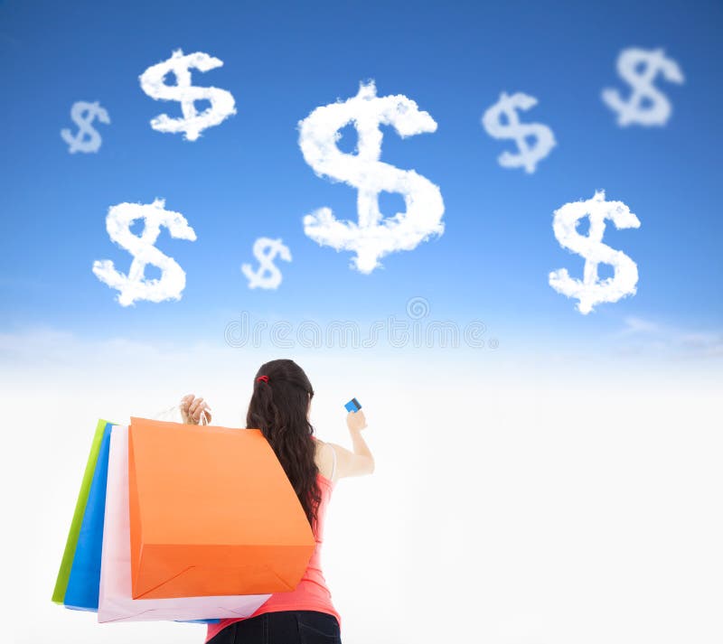 Young woman holding shopping bags and credit card royalty free stock photo Young woman holding shopping bags and credit card royalty free stock photo