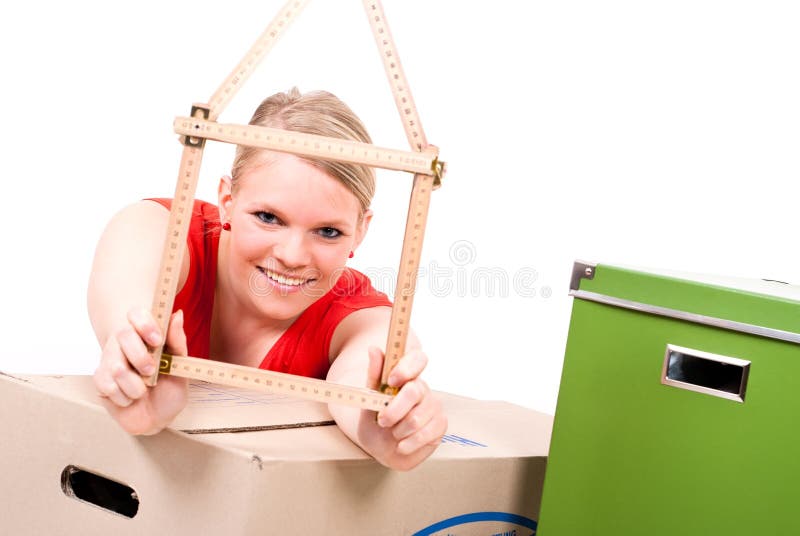 Young woman with house symbol