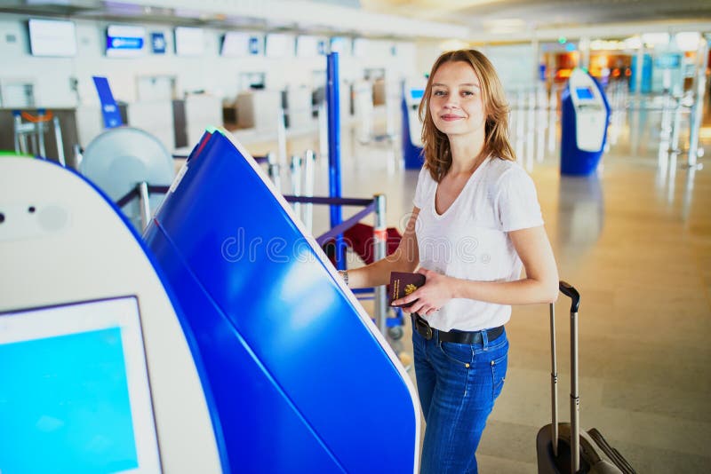 Young woman in international airport stock images Young woman in international airport stock images