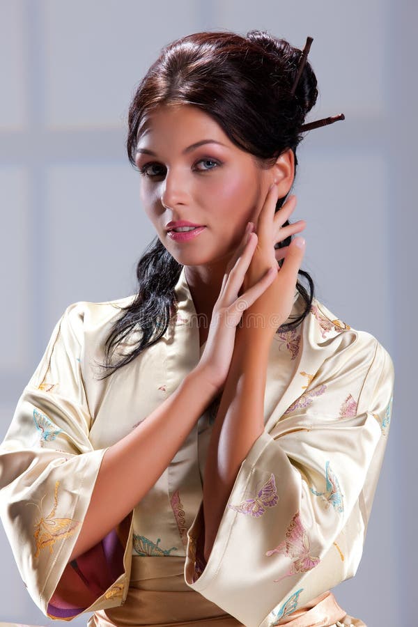 Young Woman in Japanese Clothing Stock Photo - Image of human, cream