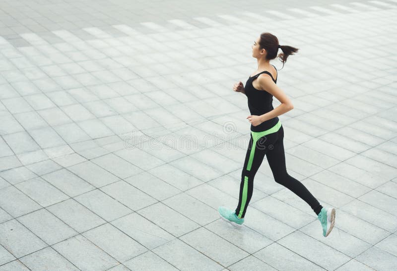 Young Woman Jogging in City Copy Space Stock Photo - Image of jogger ...