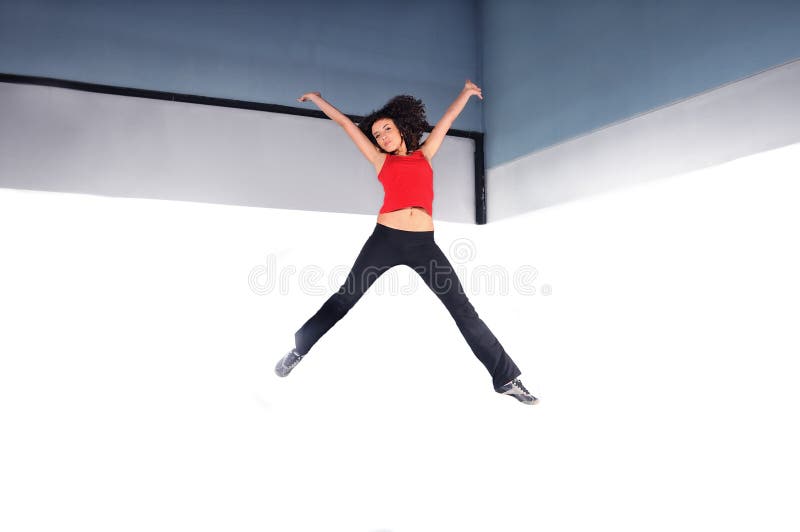 Young woman jumping royalty free stock image