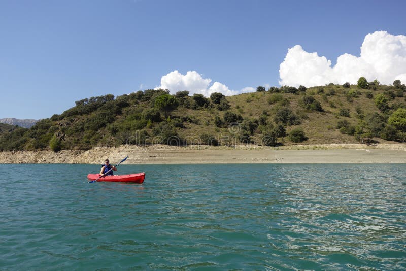 Young woman with a kayak stock photography Young woman with a kayak stock photography