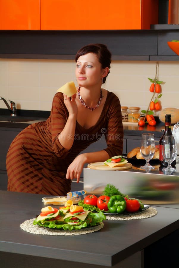 The young woman on kitchen