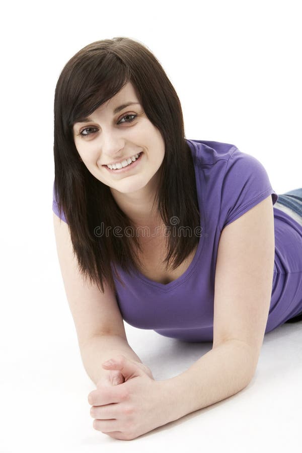 Young Woman Laying On Stomach royalty free stock photos Young Woman Laying On Stomach royalty free stock photos