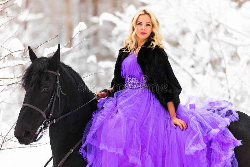 Young Woman In Long Dress Riding A Horse In Winter Stock Photo Image