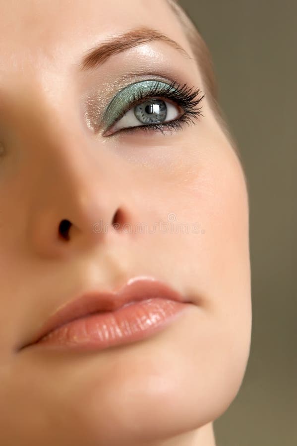 Young woman look at up