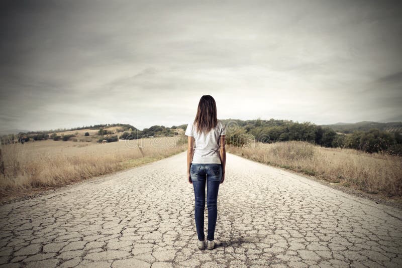 Young woman looking at the street