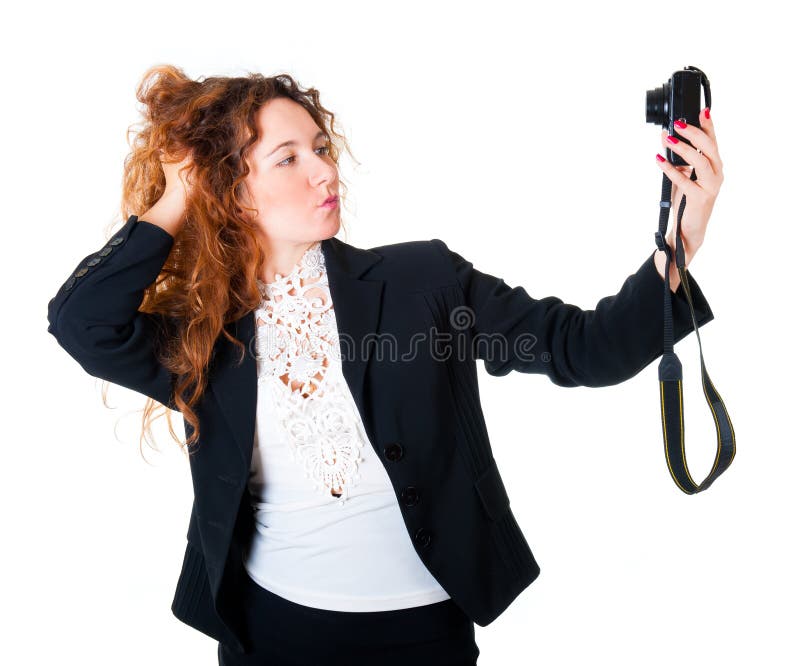 Young woman makes self-portraits royalty free stock image