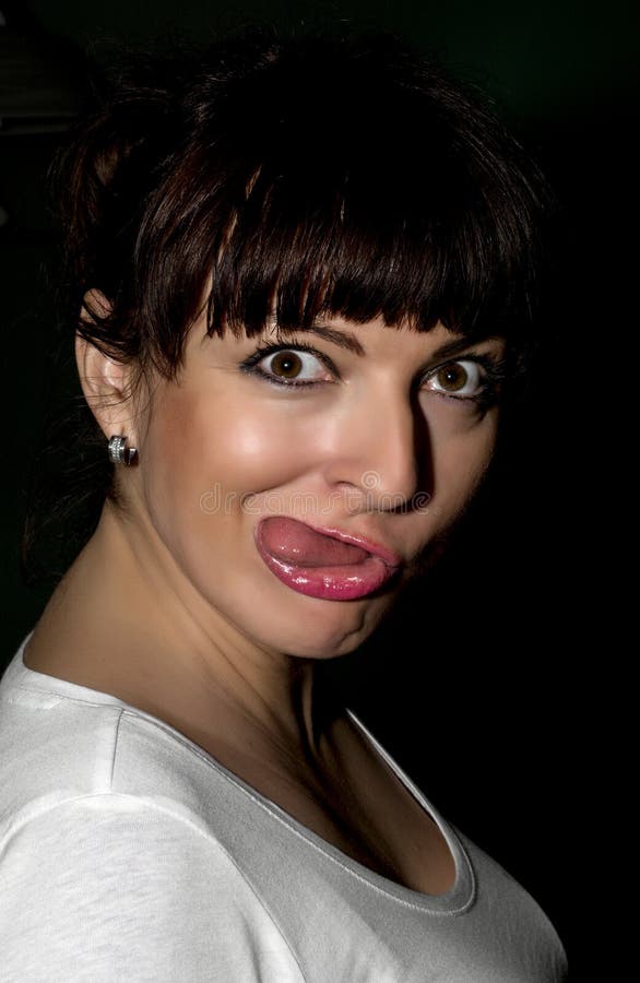 Young caucasian woman making a funny face. White funny face stock images, royalty-free photos and pictures