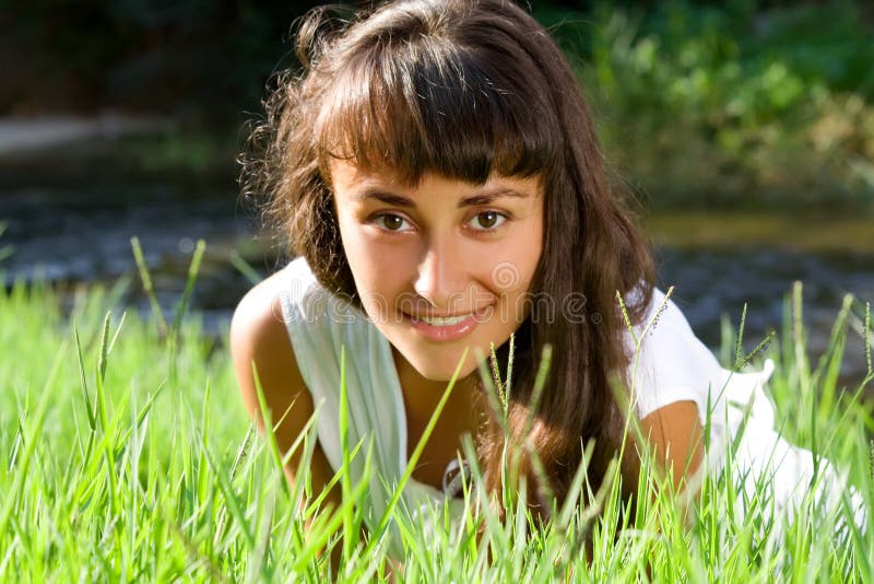 Young woman on the meadow