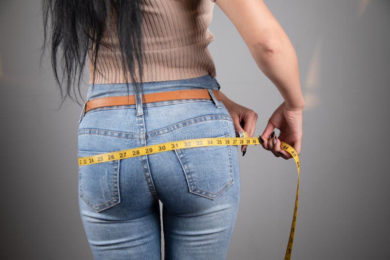 Young Woman Measuring Her Waist Stock Photo - Image of person, waist ...