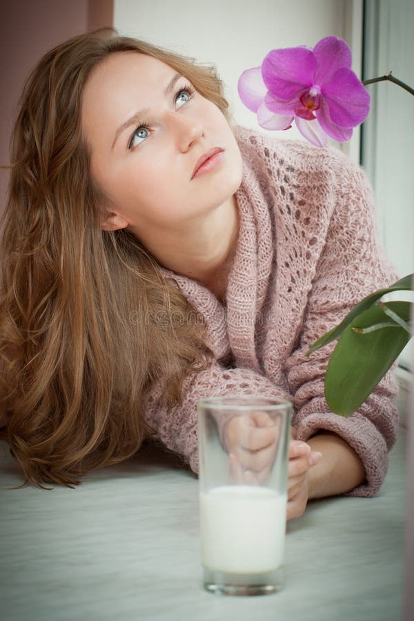 Young woman and milk.