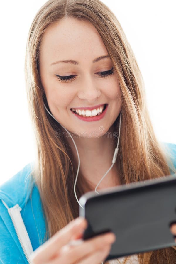 Young woman with music player stock images