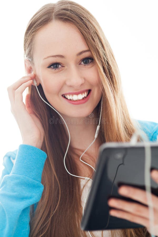 Young woman with music player stock photography