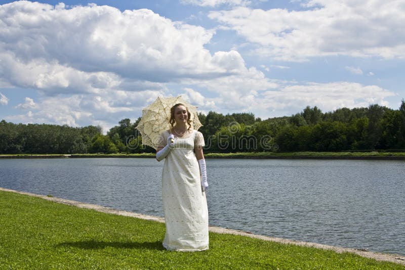 Young woman near lake