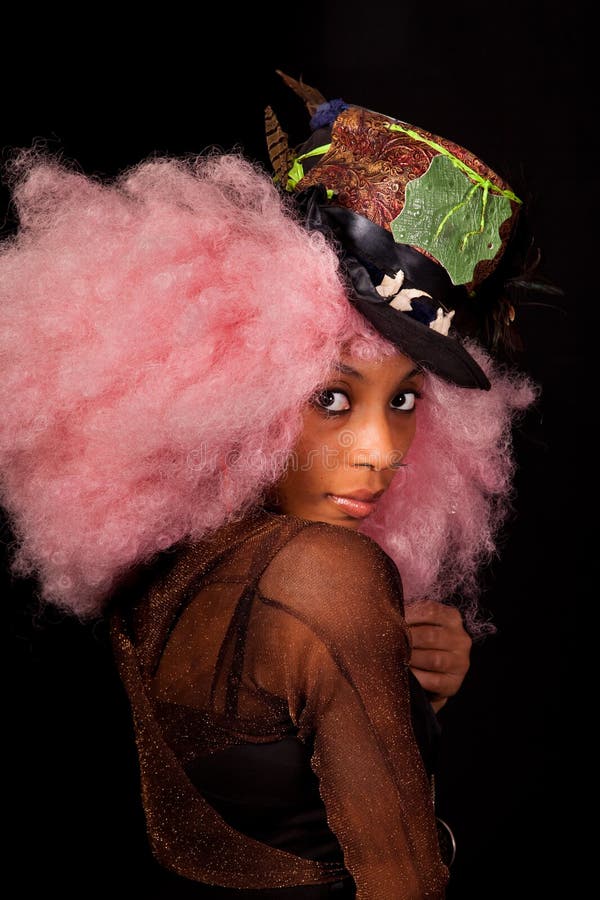 Portrait of a beautiful young woman in a neo-burlesque costume. Portrait of a beautiful young woman in a neo-burlesque costume.