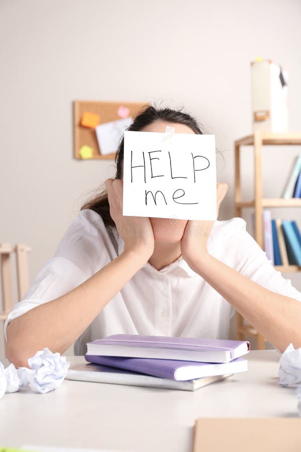 Young woman with note HELP ME on forehead royalty free stock photos Young woman with note HELP ME on forehead royalty free stock photos
