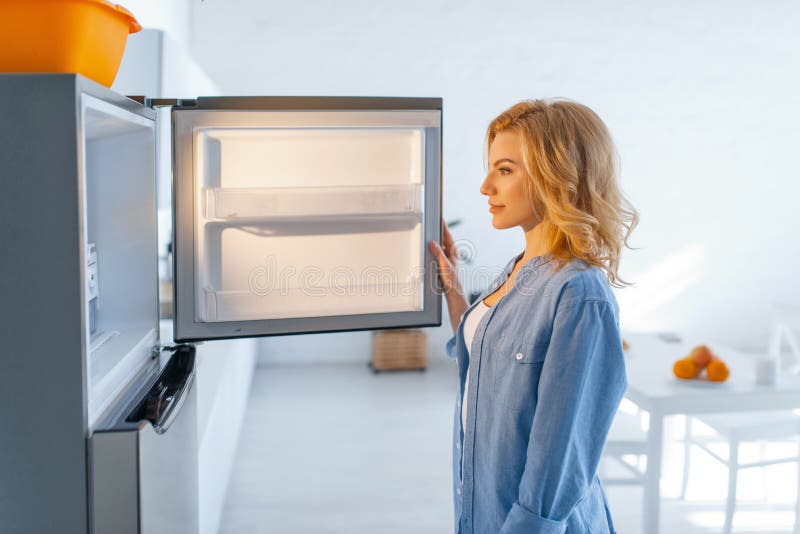 Young Woman Opened the Fridge on the Kitchen Stock Photo - Image of ...