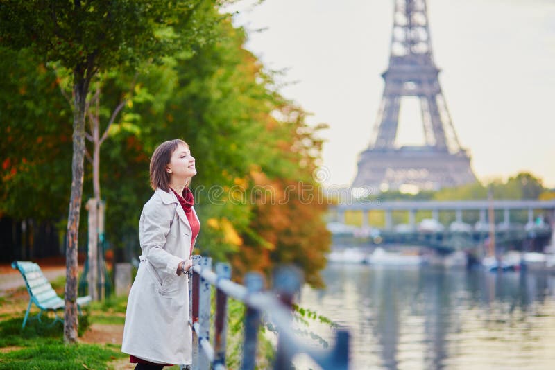 Young woman in Paris near the Eiffel tower royalty free stock photo Young woman in Paris near the Eiffel tower royalty free stock photo