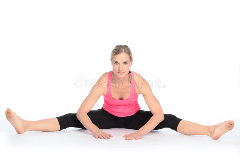 Yoga Indoors: Wide Leg Seated Hamstring Stretch Stock Photo