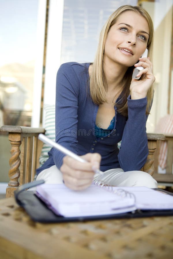 A young woman on the phone