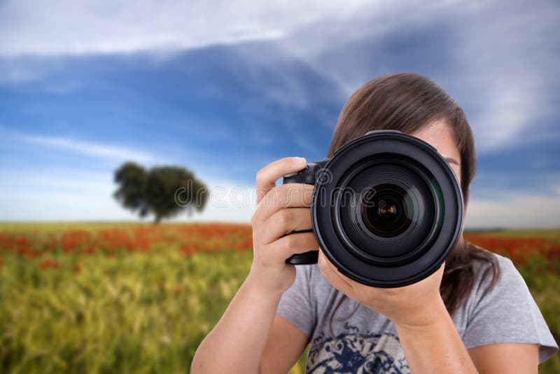 Young woman photographing landscapes