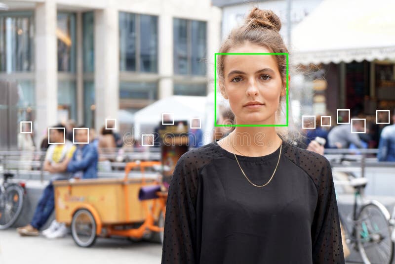 Young woman picked out by face detection or facial recognition software stock photo