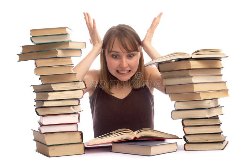 Young woman and a pile of books