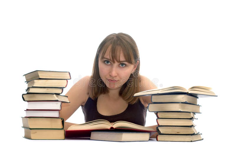 Young woman and a pile of books
