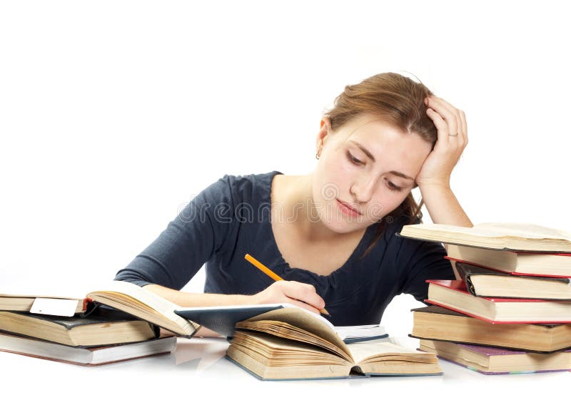 Young woman and a pile of books