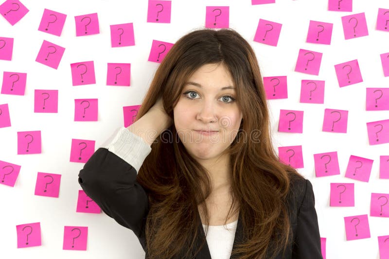 Young woman pink sticky notes question marks