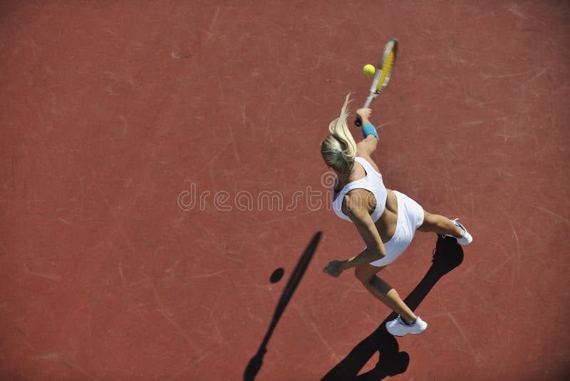 Young woman play tennis outdoor