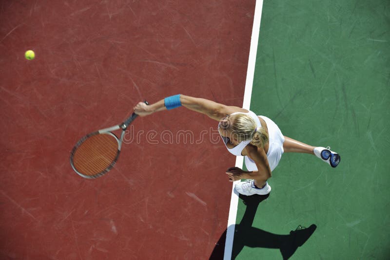 Young woman play tennis outdoor