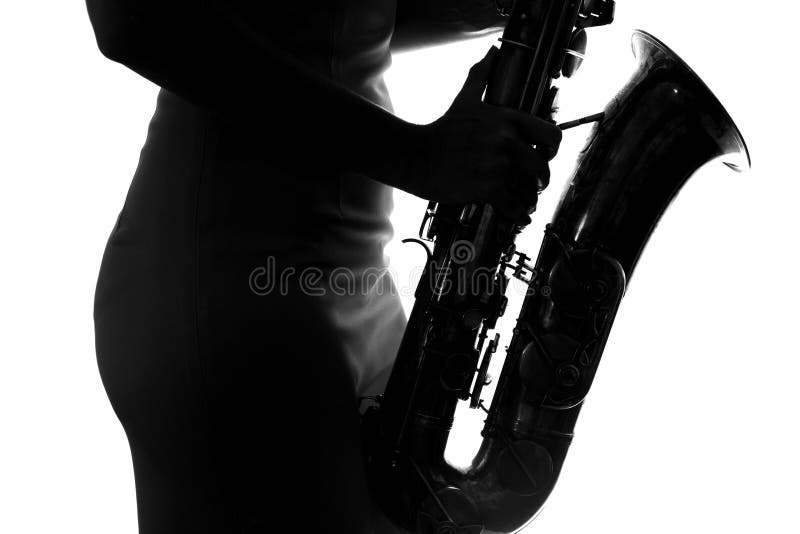Young woman playing the saxophone stock images Young woman playing the saxophone stock images