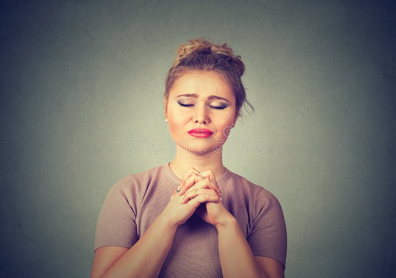 Young woman praying