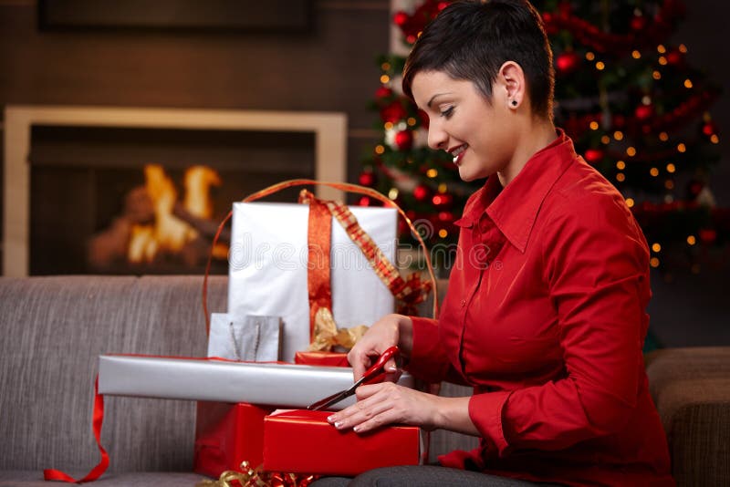 Young woman preparing for christmas eve stock photography Young woman preparing for christmas eve stock photography