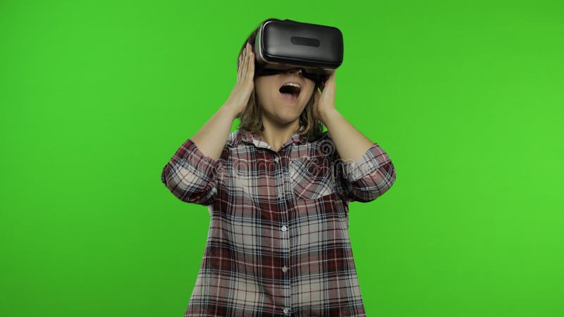 Girl Using Vr App Helmet To Play Simulation Scary Game Woman Watching