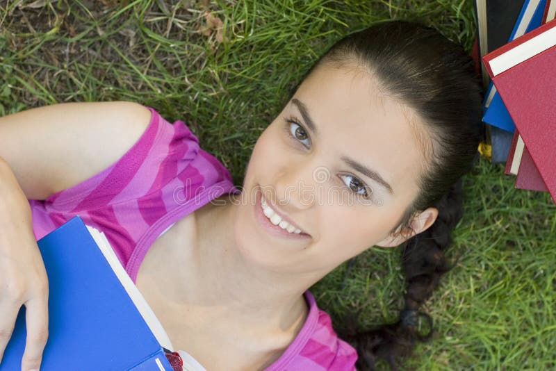 Young woman reading outdoor