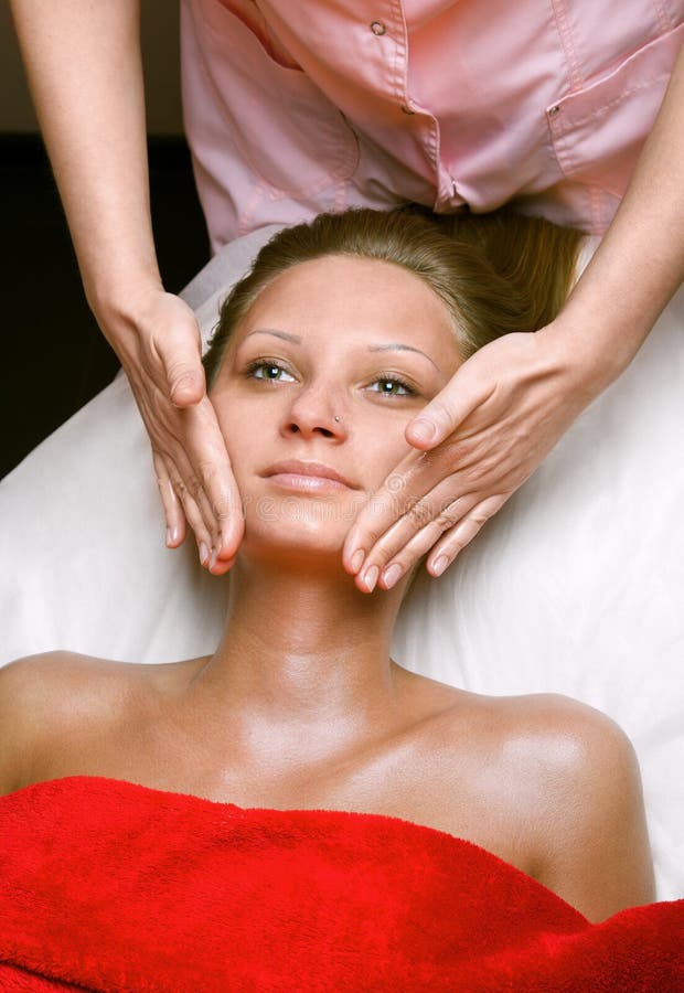 Young Woman Receiving Face Massage In The Beauty Clinic Stock Image