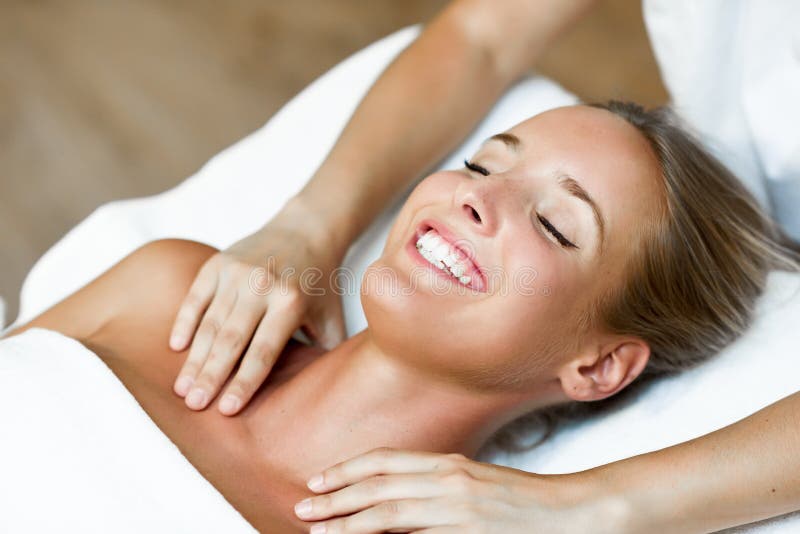 Young Woman Receiving A Head Massage In A Spa Center Stock Image Image Of Blonde Girl 102739693
