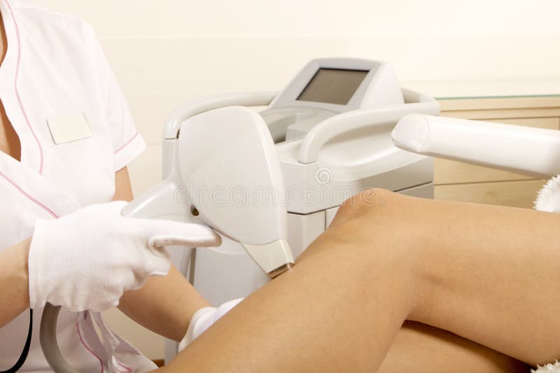 Young woman receiving laser therapy