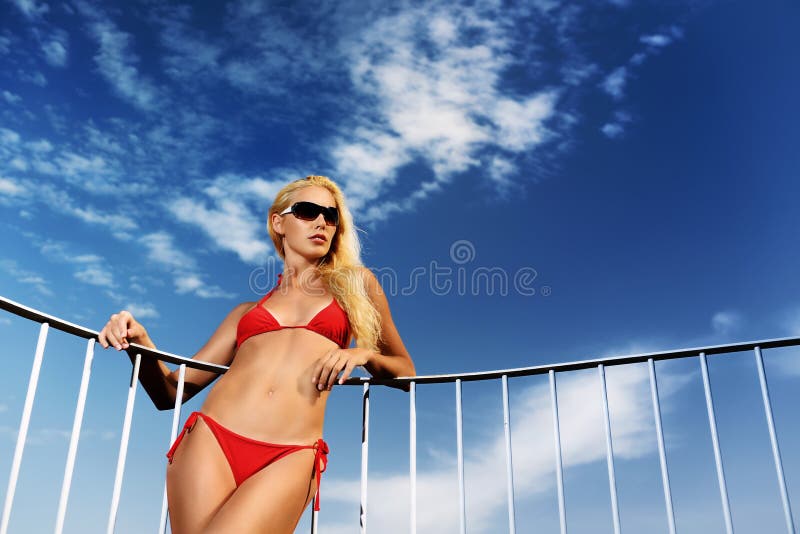 Young woman in a red bikini