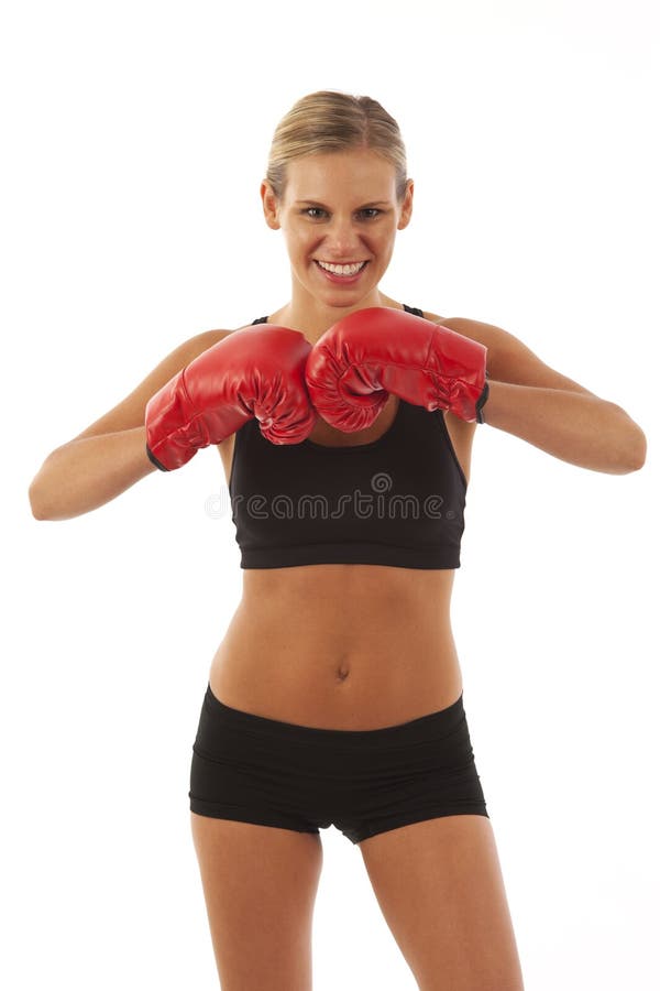 Young woman with red boxing gloves