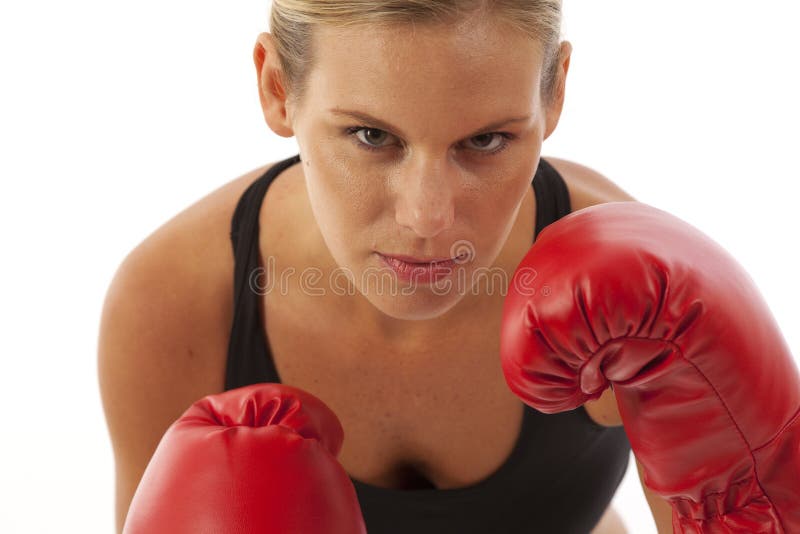 Young woman with red boxing gloves