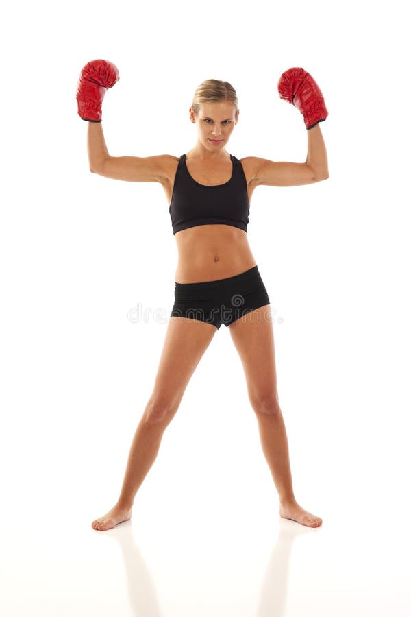 Young woman with red boxing gloves