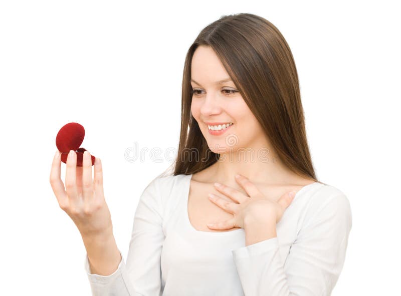 Young woman with red gift box with jewellery