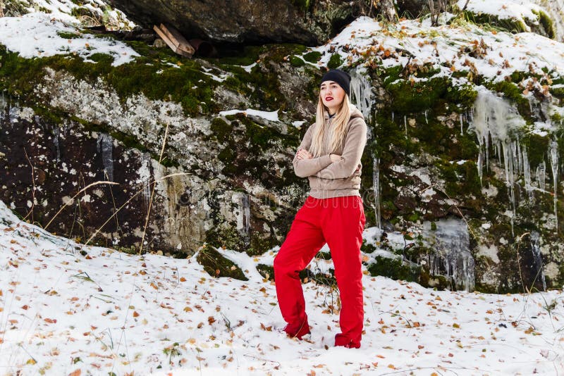 Young woman in red pants stock photos Young woman in red pants stock photos