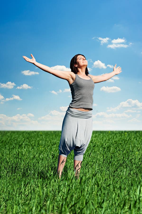 Young woman relaxing at the field royalty free stock image Young woman relaxing at the field royalty free stock image