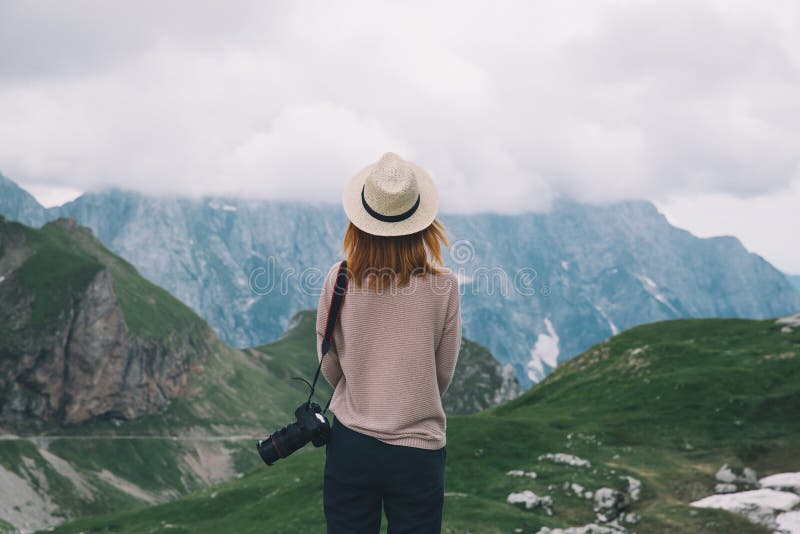 Young woman relaxing outdoor travel freedom lifestyle with mount